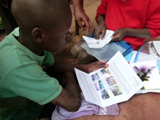 One of the children reads a letter from his sponsor